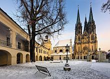 A cluster of heritage monuments on Wenceslas Square – Archdiocesan Museum, Chapel of St. Barbara, Chapel of St. Anne, part of Zdík Palace, and ...